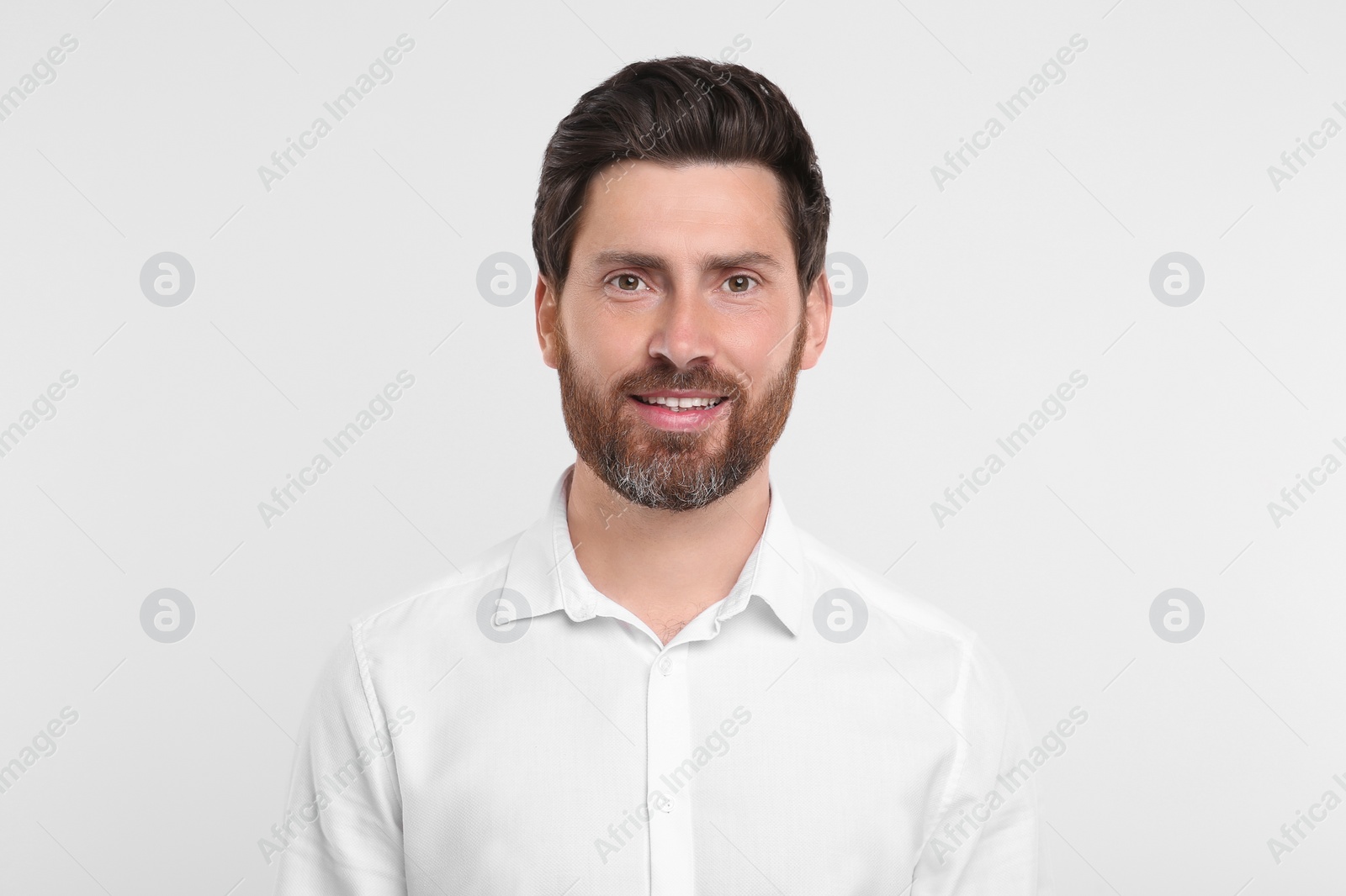 Photo of Portrait of handsome man on white background