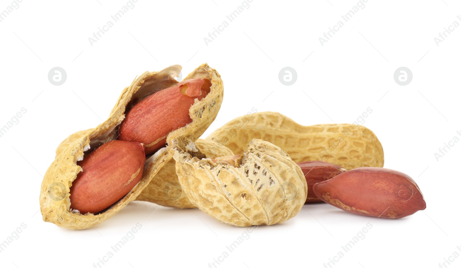 Photo of Fresh unpeeled peanuts isolated on white. Healthy snack