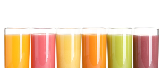 Photo of Glasses with different fresh juices on white background