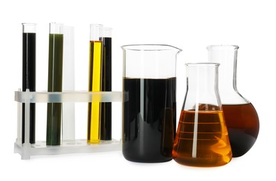 Beaker, test tubes and flasks with different types of oil isolated on white