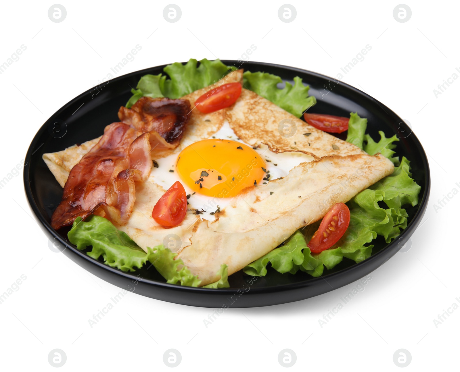 Photo of Delicious crepe with egg isolated on white. Breton galette