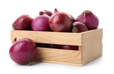Photo of Ripe red onions in wooden crate isolated on white