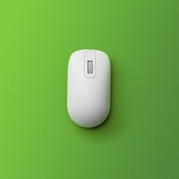 Image of Modern wireless computer mouse on green background, top view