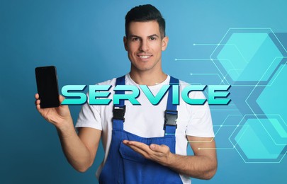 Image of Repairman with modern smartphone on blue background