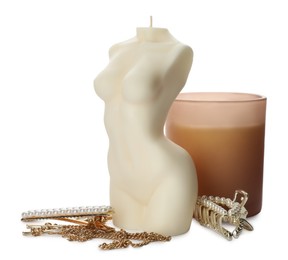 Photo of Beautiful female body shape candle and accessories on white background
