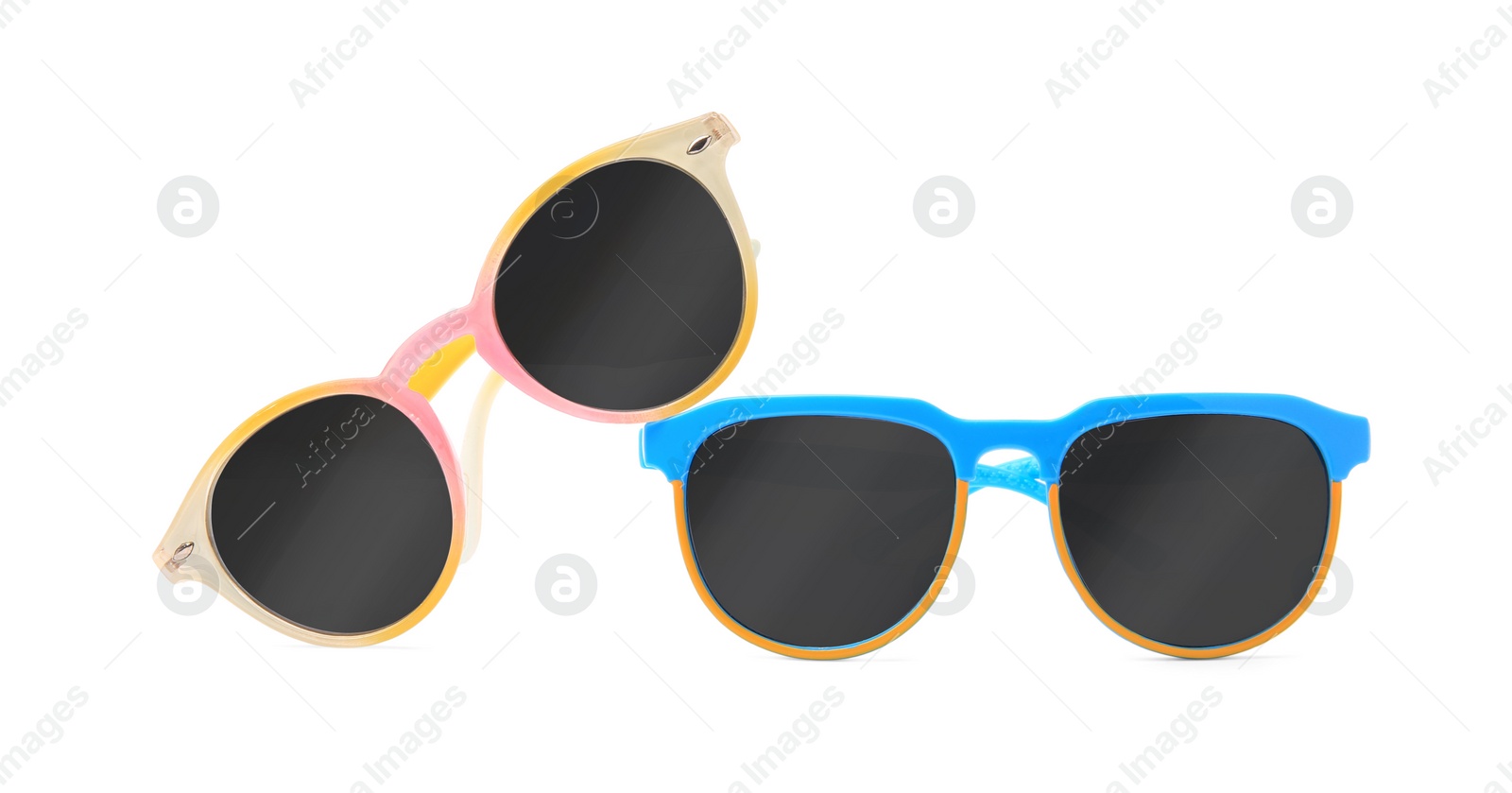 Photo of Different sunglasses isolated on white. Stylish accessory