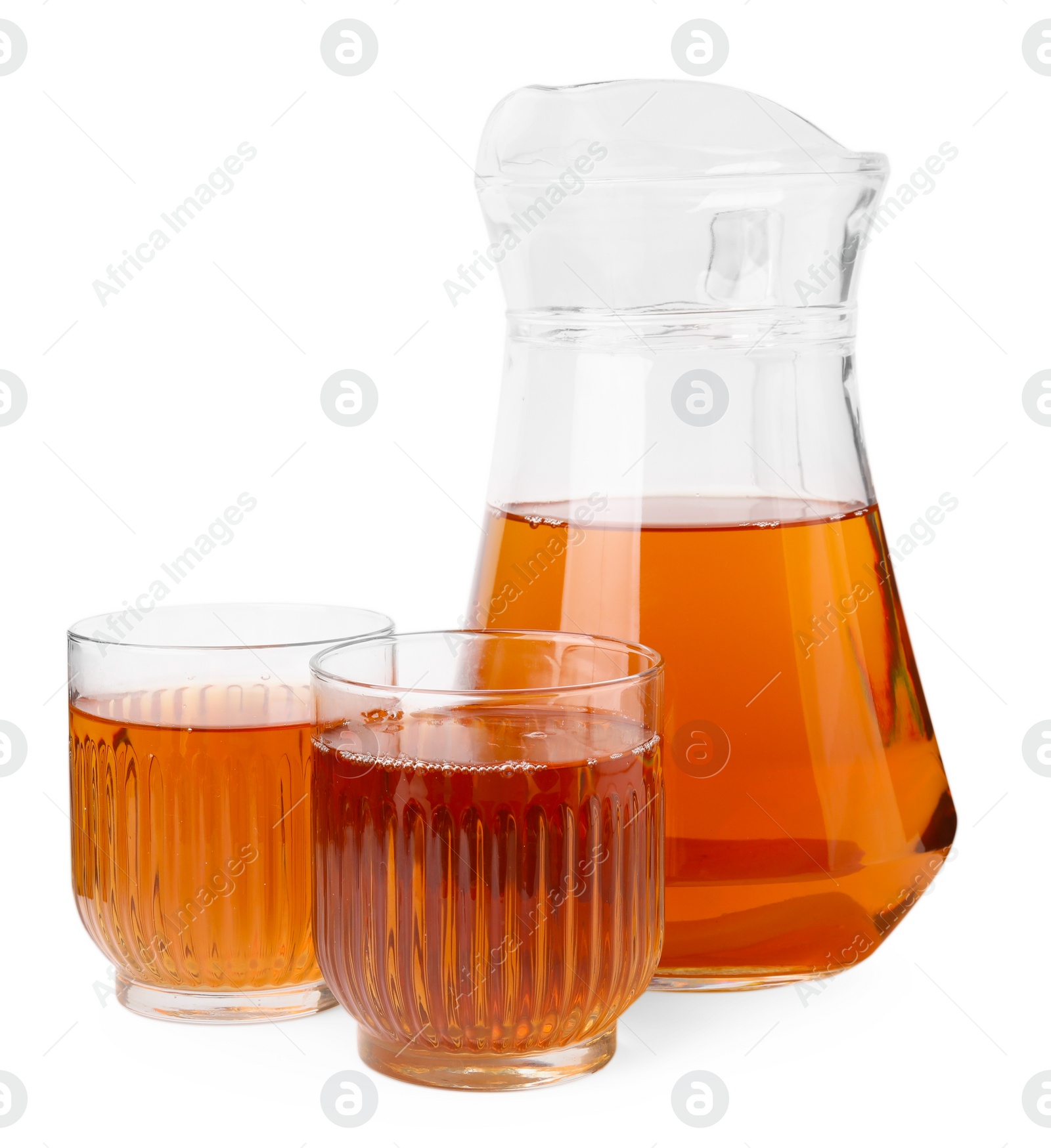 Photo of Tasty kombucha in glasses and jug isolated on white