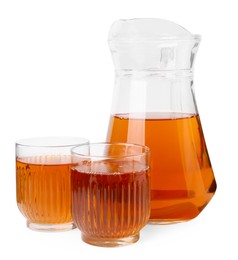 Photo of Tasty kombucha in glasses and jug isolated on white