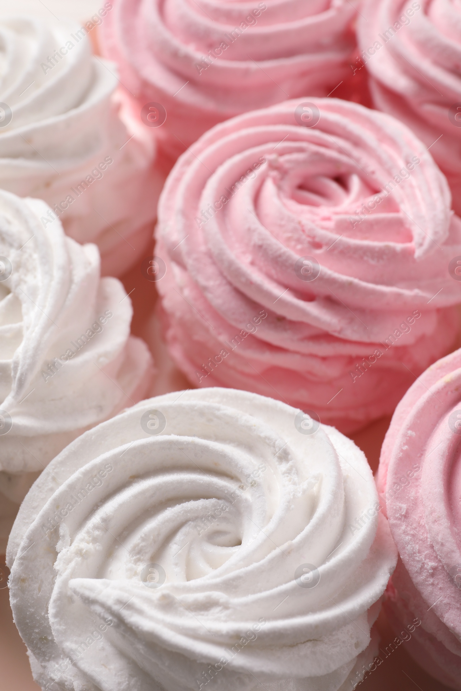 Photo of Many pink and white delicious zephyrs, closeup view