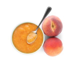 Peach puree in bowl and fresh fruits on white background, top view