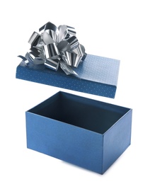 Photo of Open empty gift box with bow on white background