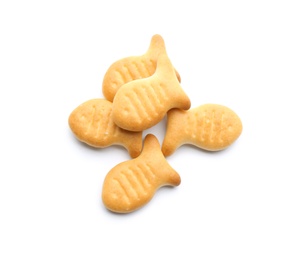 Photo of Delicious crispy goldfish crackers on white background, top view