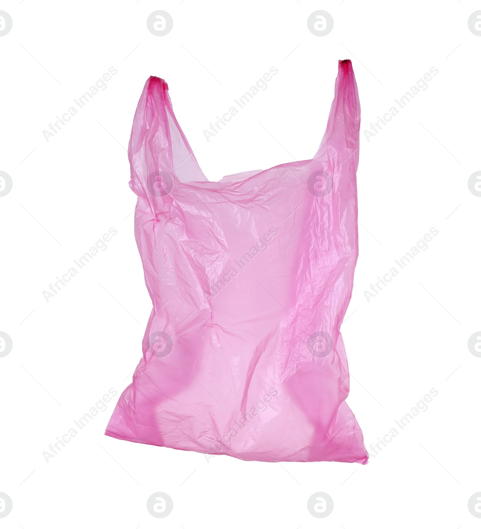 Photo of One pink plastic bag isolated on white