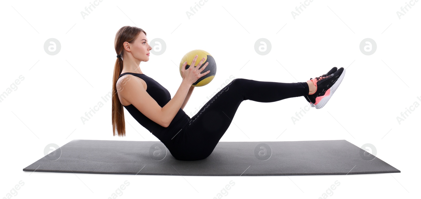 Photo of Athletic woman doing exercise with medicine ball isolated on white