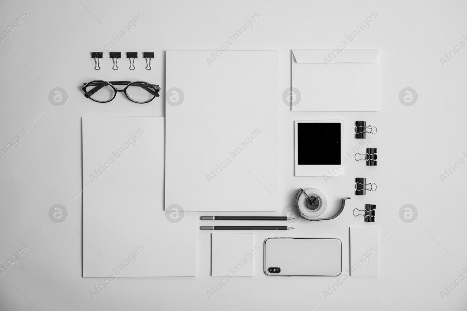 Photo of Flat lay composition with stationery on light background. Mock up for design