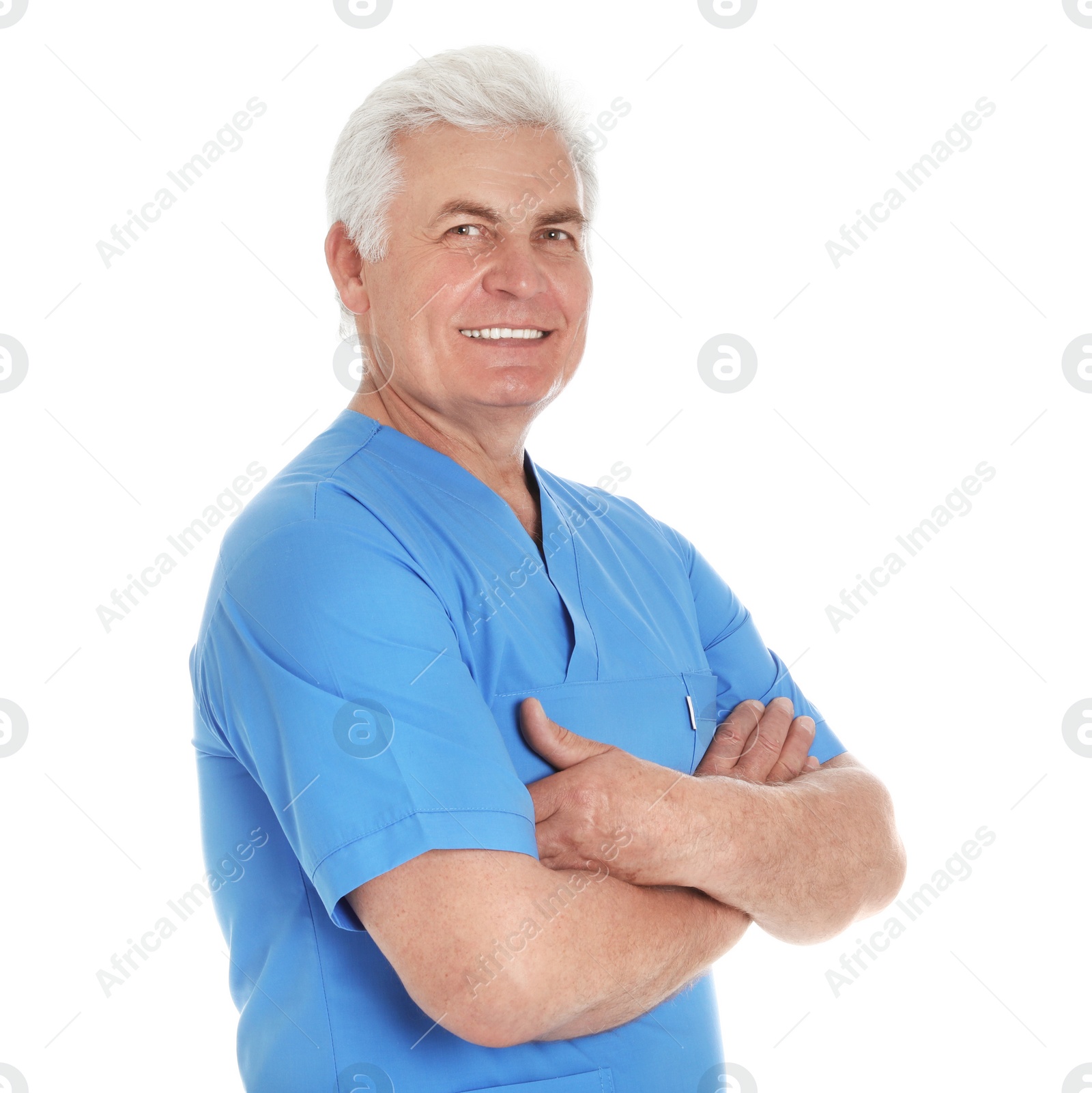 Photo of Portrait of male doctor in scrubs isolated on white. Medical staff