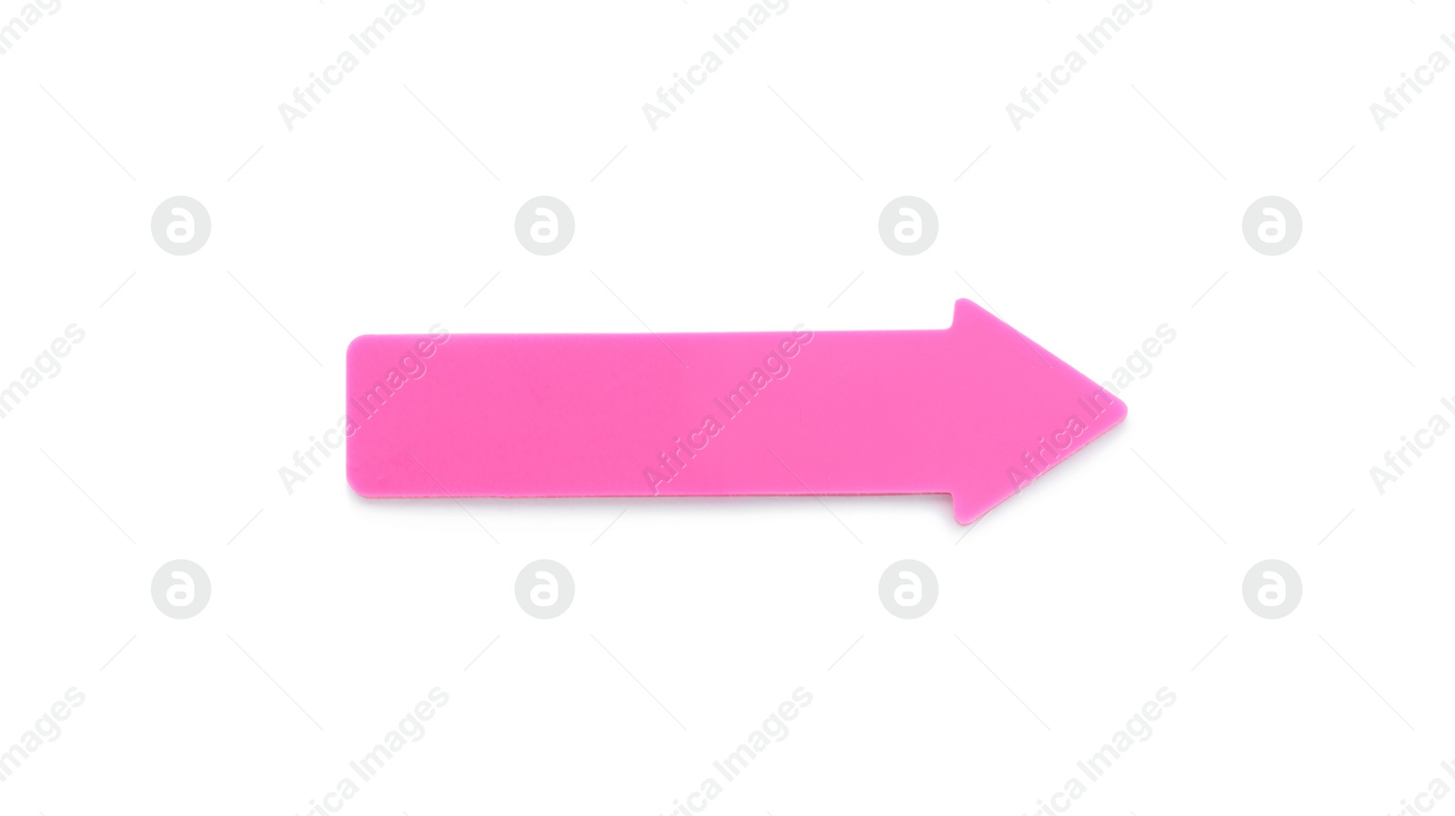 Photo of Colorful arrow shaped sticky note on white background. School stationery