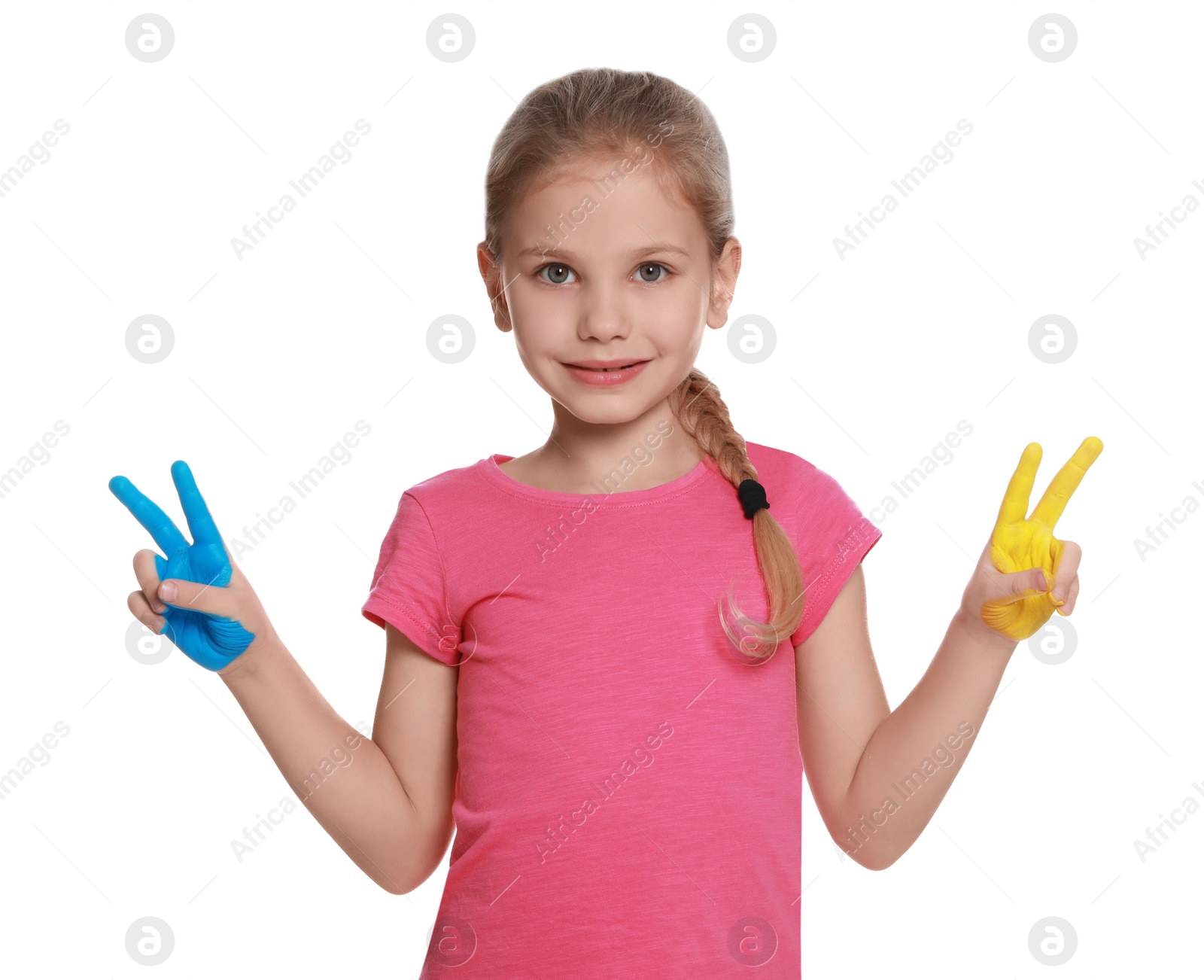 Photo of Little girl with hands painted in Ukrainian flag colors on white background. Love Ukraine concept