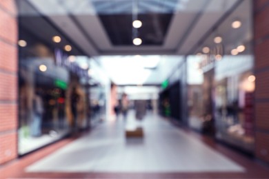 Photo of Blurred view of shopping mall interior. Bokeh effect