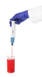 Photo of Laboratory analysis. Scientist dripping sample with micropipette into beaker on white background, closeup