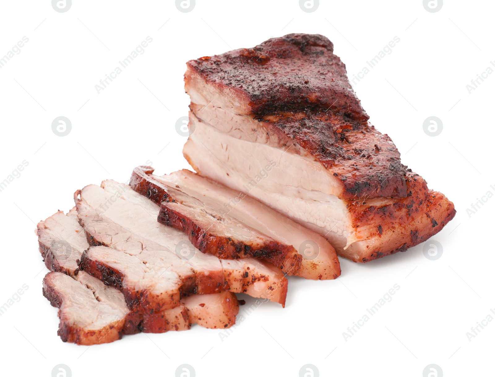 Photo of Pieces of tasty baked pork belly isolated on white