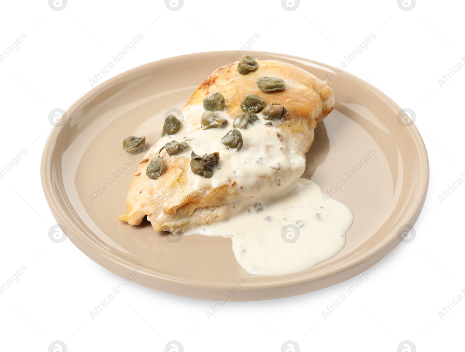 Photo of Delicious chicken fillet with capers and sauce isolated on white