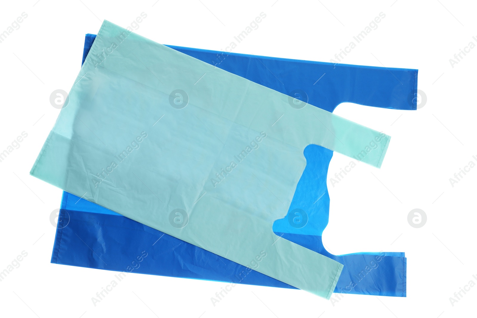 Photo of Stack of plastic bags isolated on white, top view