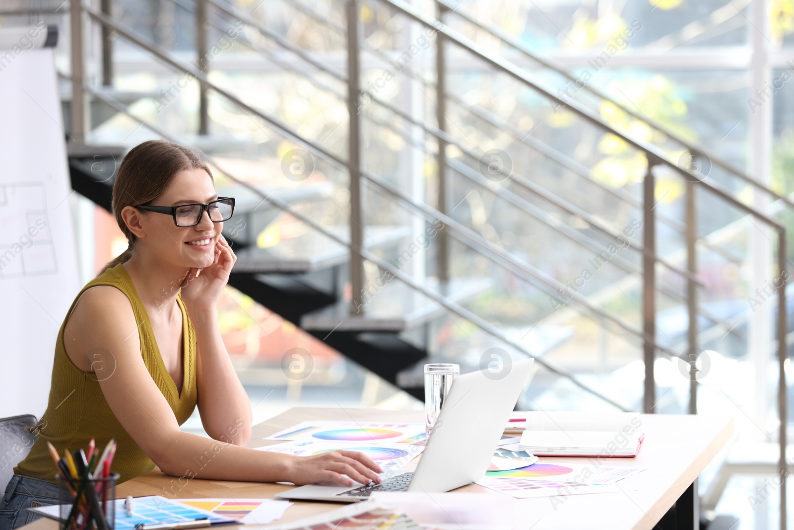 Photo of Professional interior designer at workplace in office