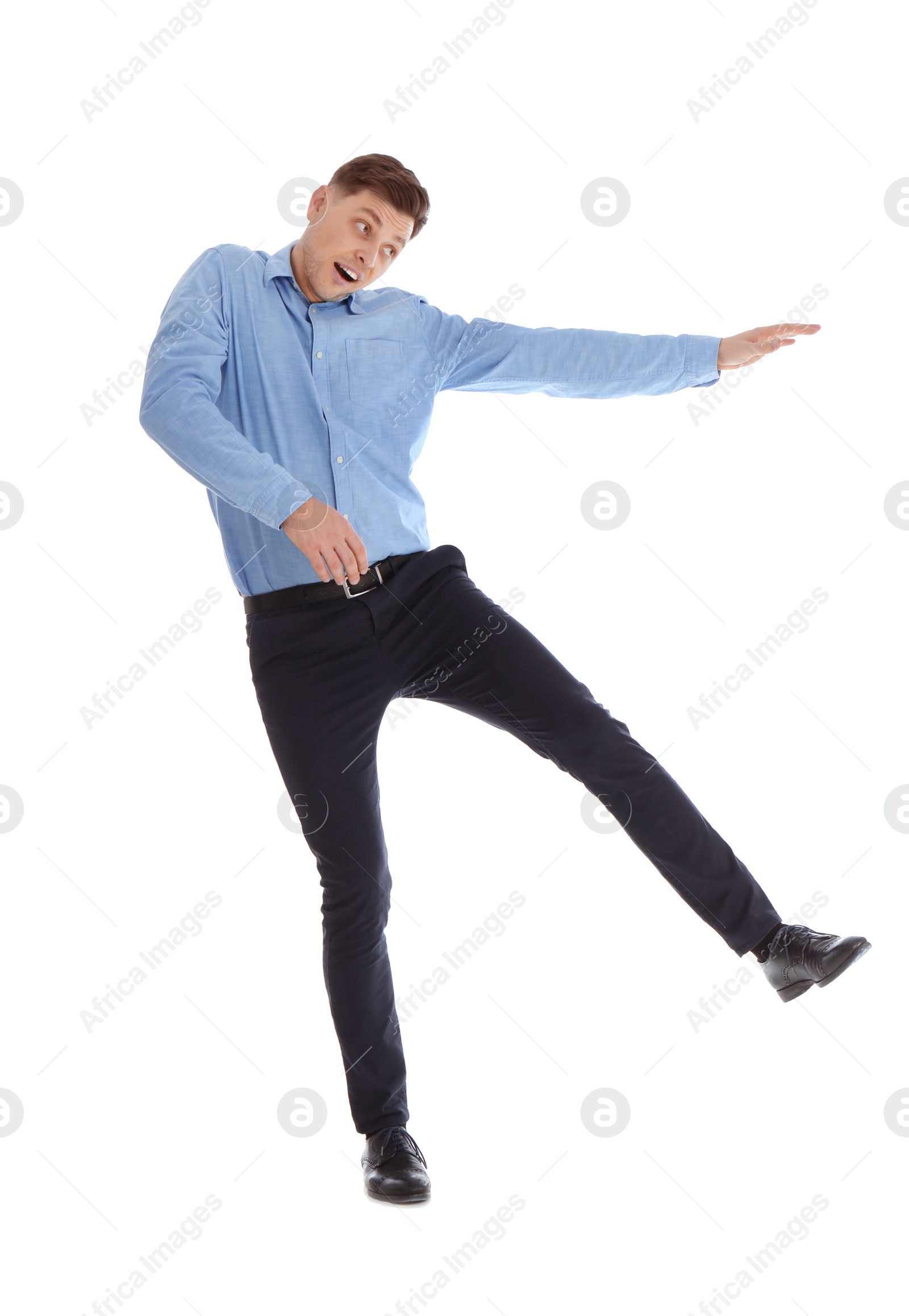 Photo of Emotional man in office wear posing on white background