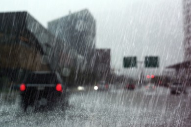 Image of View of city road on rainy day