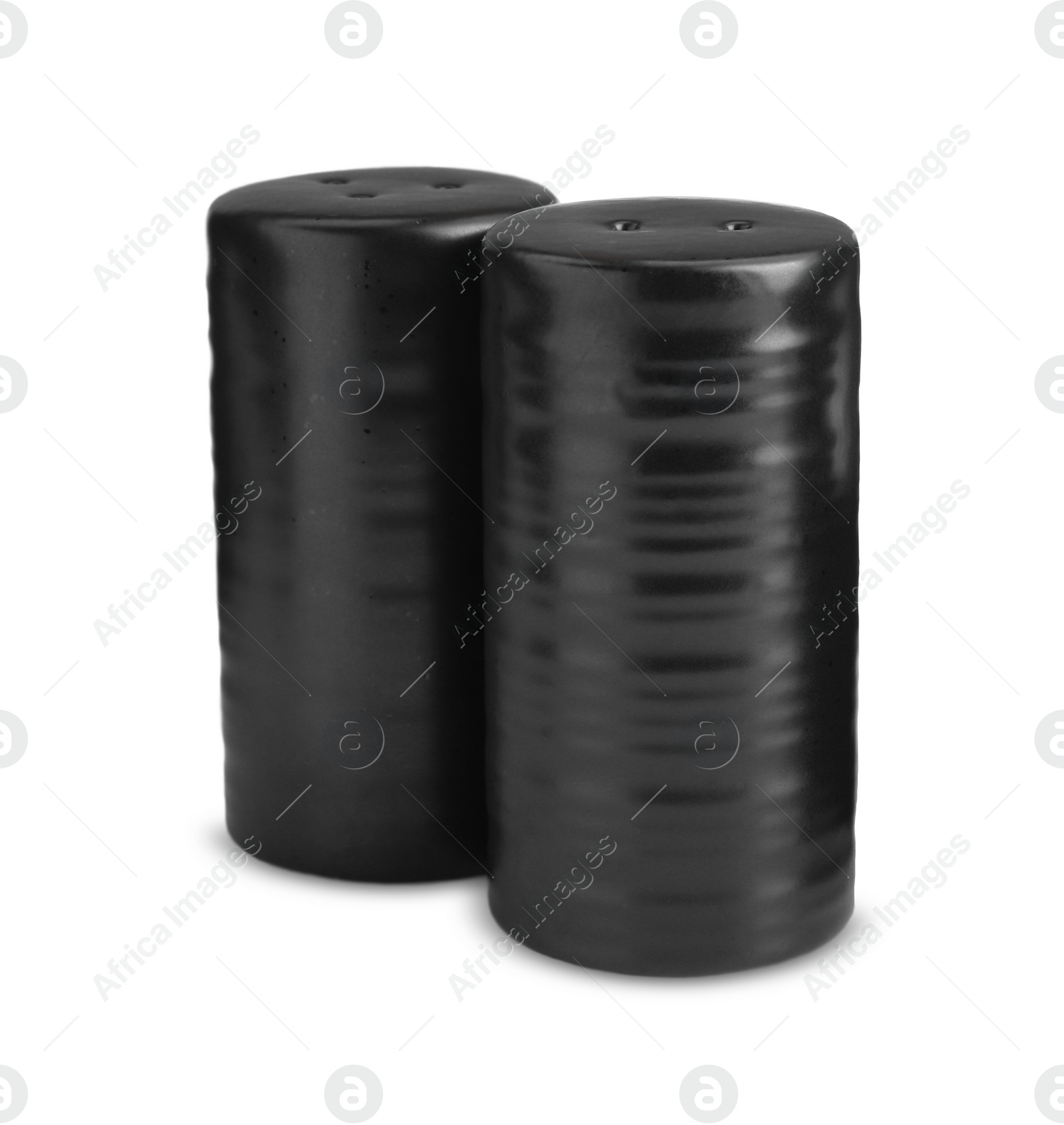 Photo of Black salt and pepper shakers isolated on white