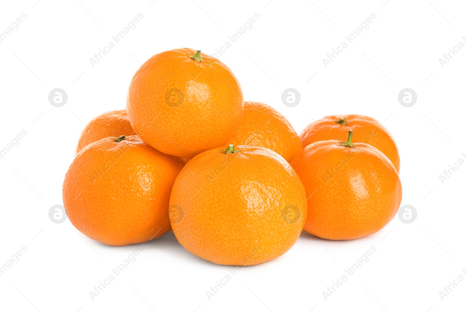 Photo of Pile of fresh juicy tangerines isolated on white