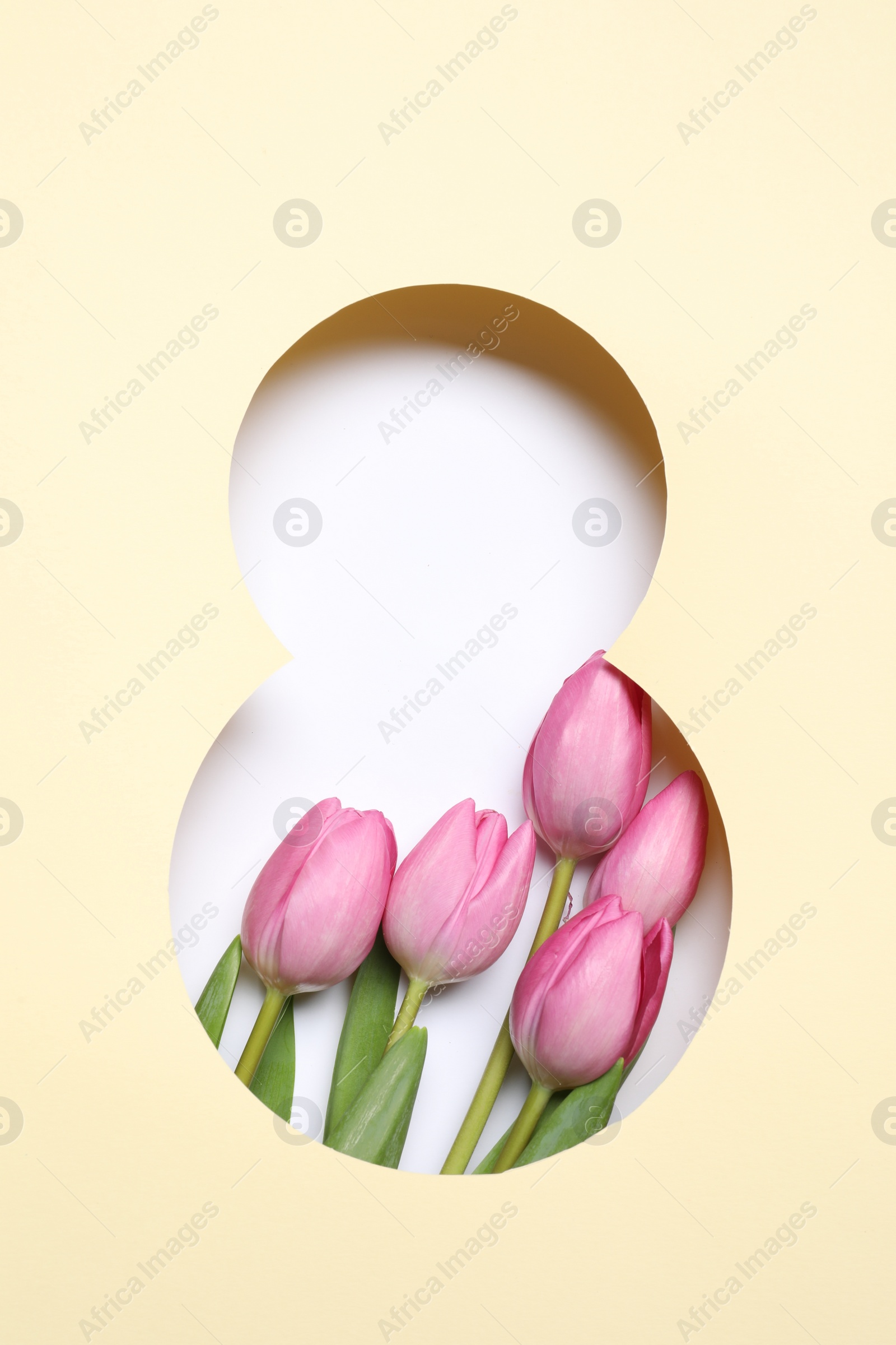 Photo of 8 March greeting card design with tulips, top view. Happy International Women's Day