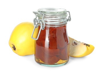 Photo of Tasty homemade quince jam in jar and fruits isolated on white