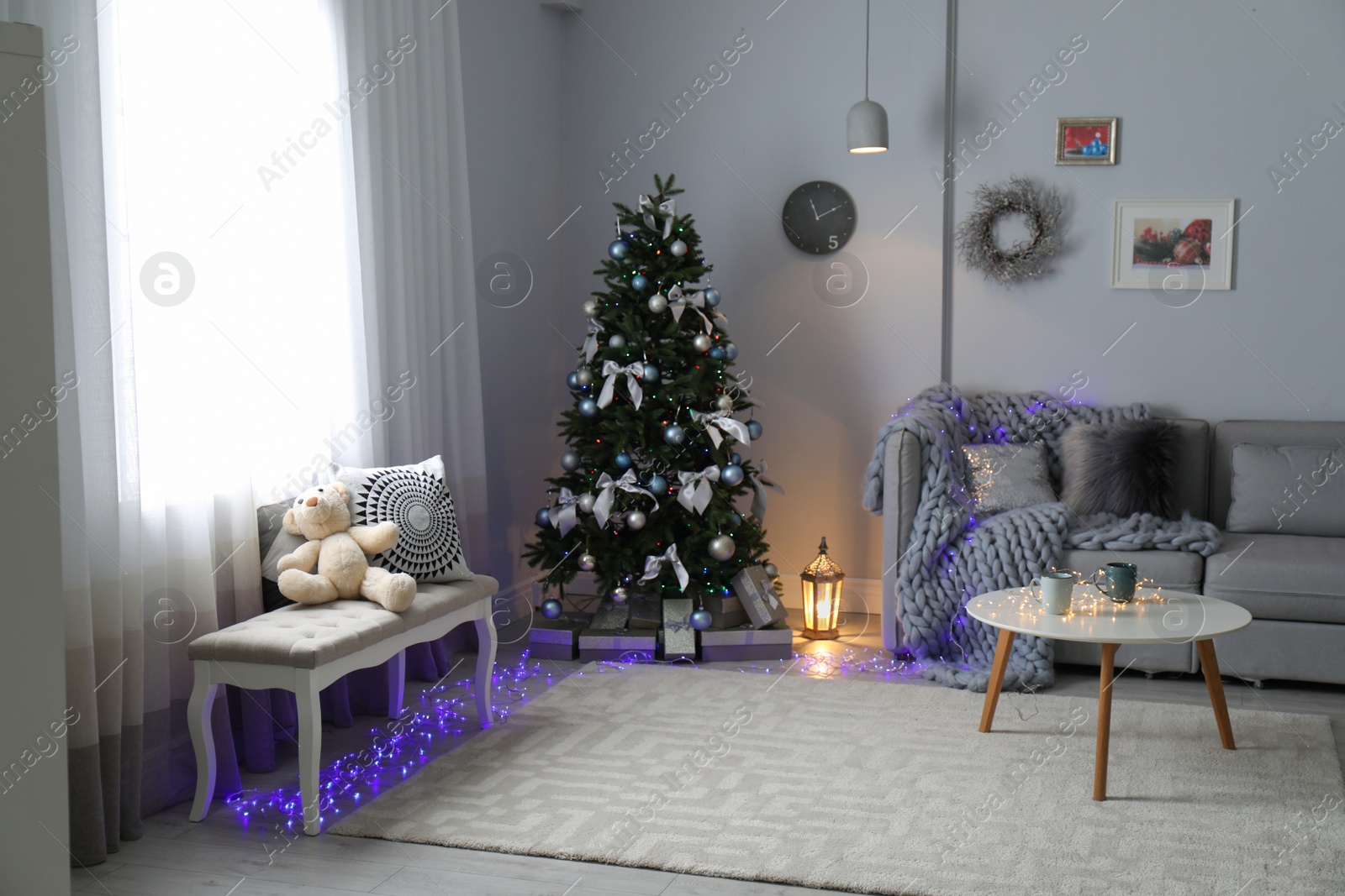 Photo of Living room interior with decorated Christmas tree