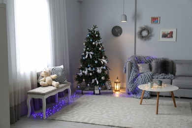 Living room interior with decorated Christmas tree