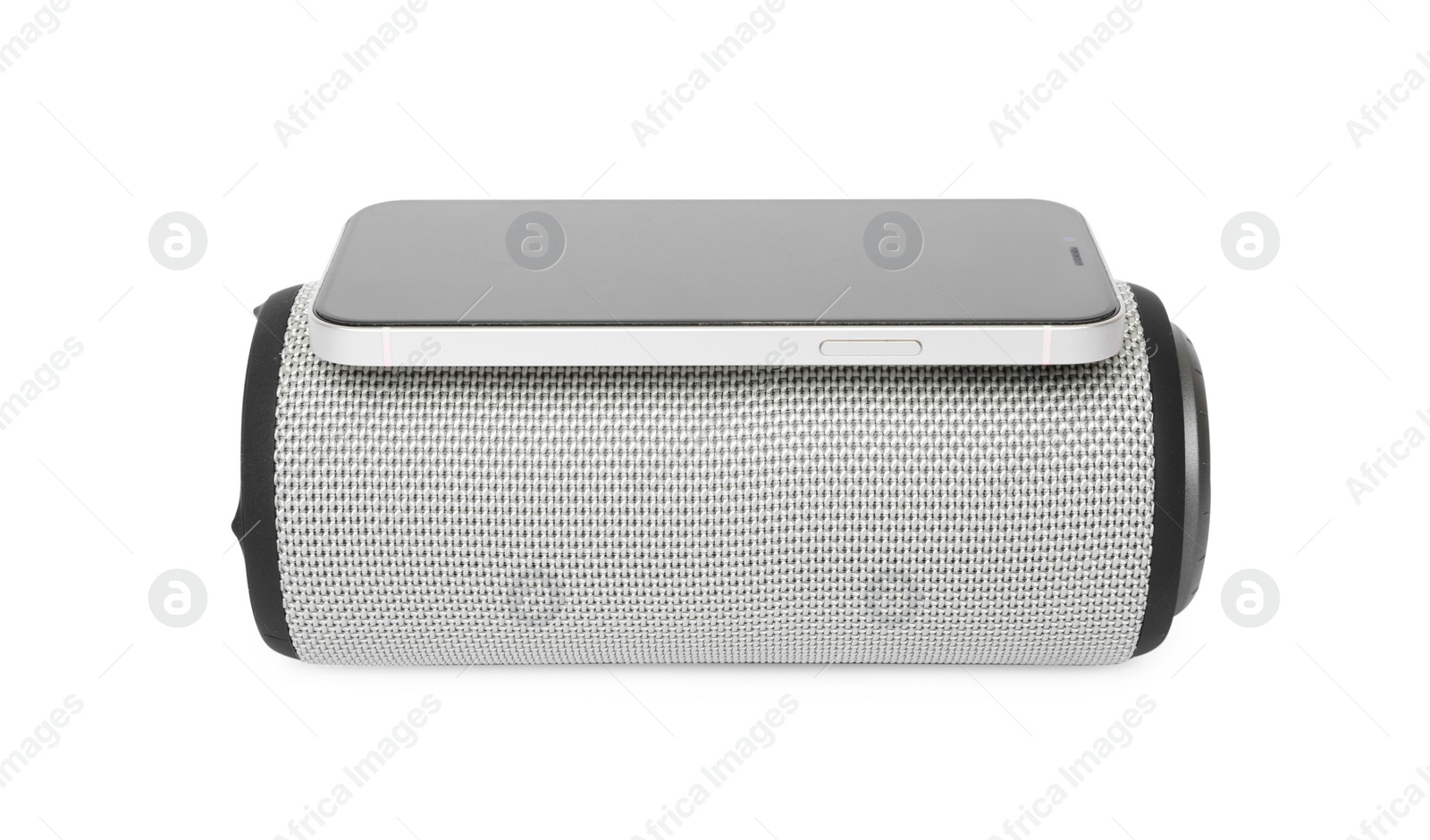 Photo of Portable bluetooth speaker and smartphone isolated on white. Audio equipment