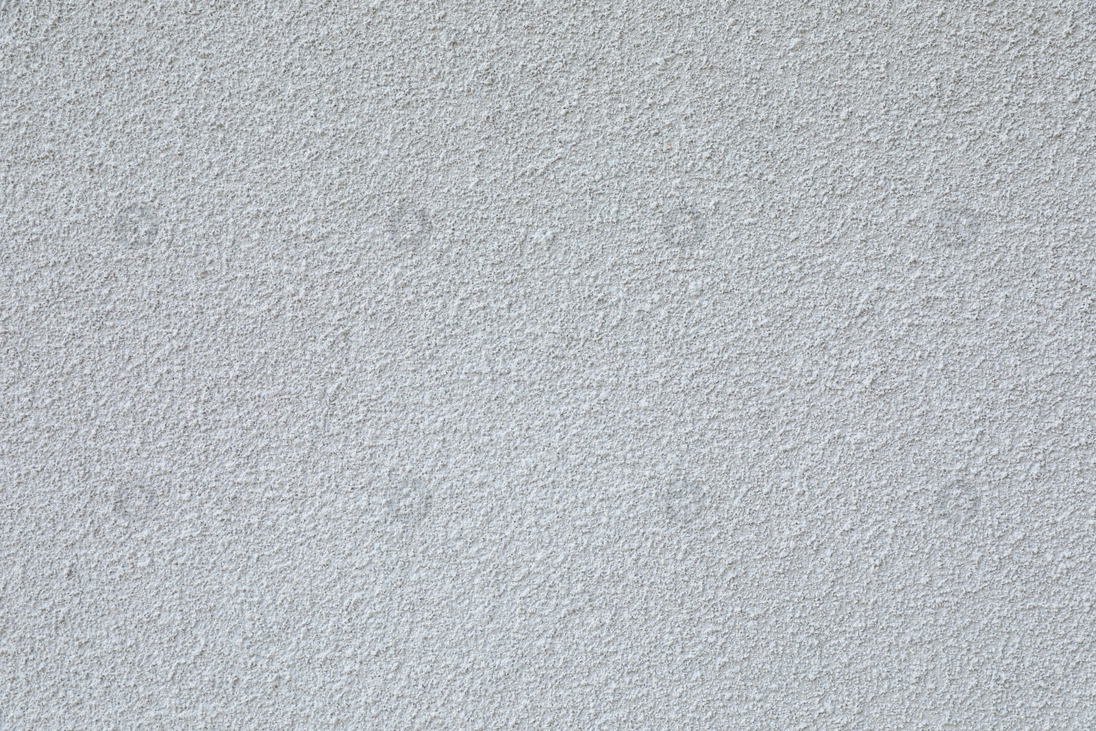 Photo of Texture of light plaster wall as background