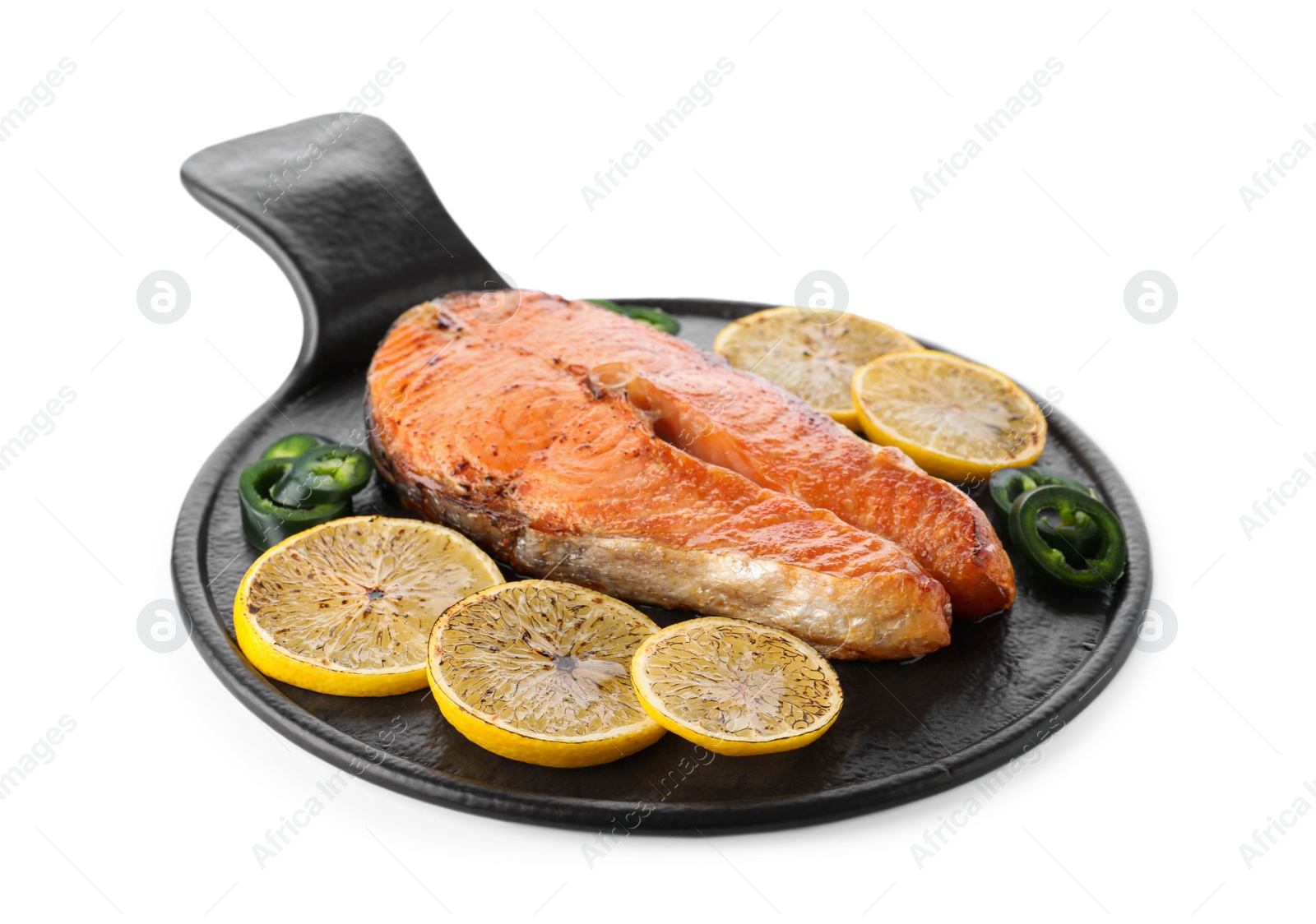 Photo of Slate plate with delicious roasted fish isolated on white