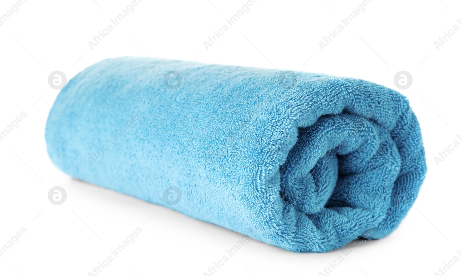 Photo of Rolled clean blue towel on white background