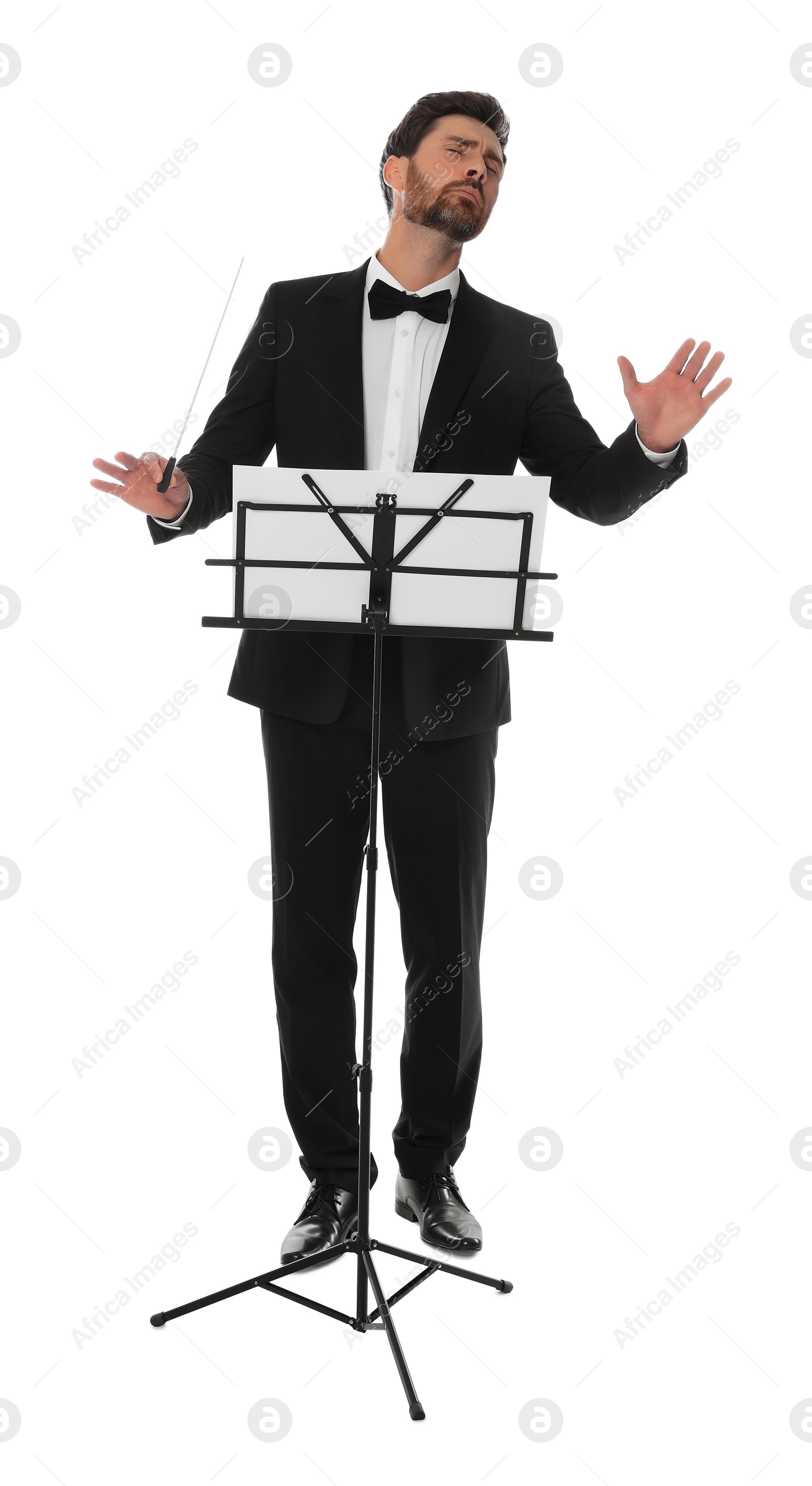 Photo of Professional conductor with baton and note stand on white background