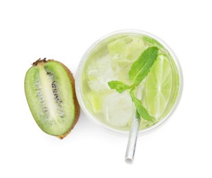 Photo of Glass of refreshing drink and cut kiwi isolated on white, top view