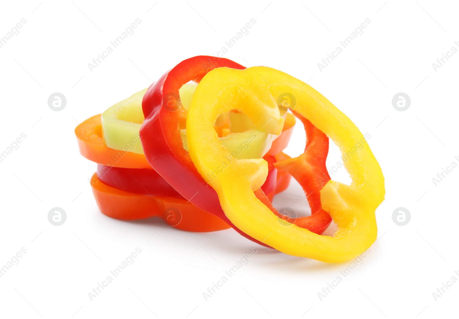 Photo of Rings of ripe bell peppers on white background