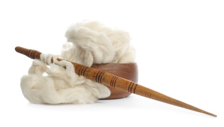 Photo of Heap of clean wool with wooden spindle and bowl isolated on white