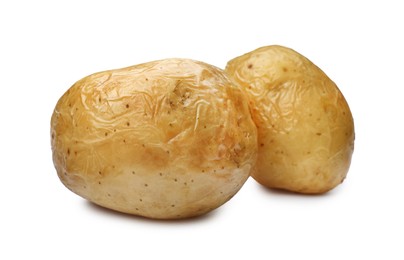 Photo of Tasty whole baked potatoes on white background