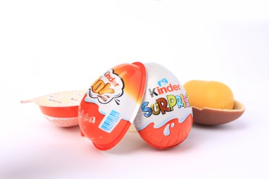 Photo of Slynchev Bryag, Bulgaria - May 24, 2023: Kinder Eggs and plastic capsule on white background