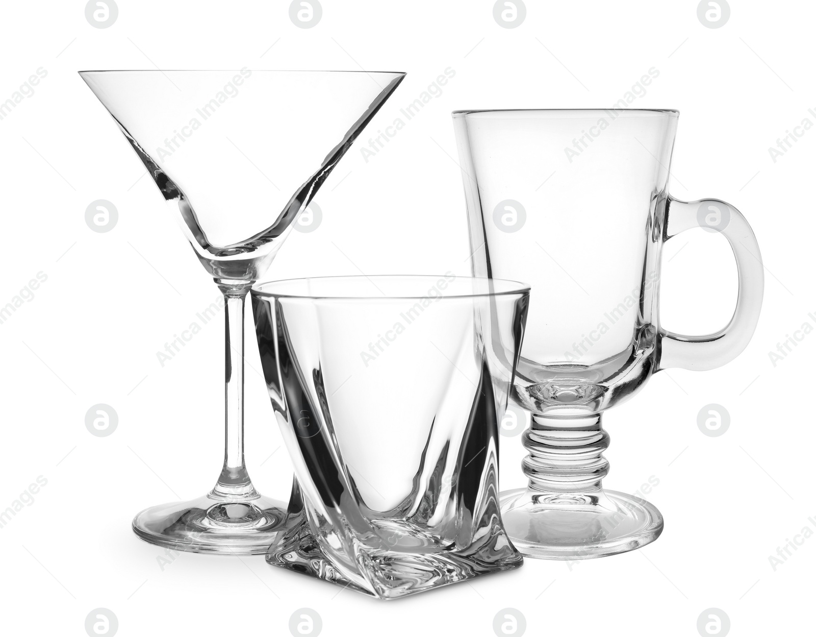 Image of Set of empty glasses on white background