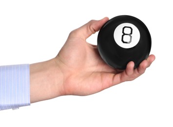 Man holding magic eight ball on white background, closeup