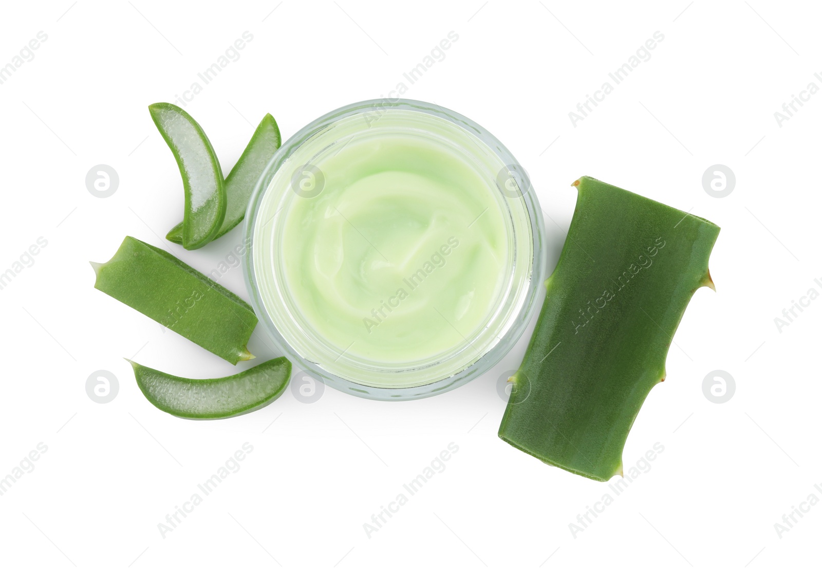 Photo of Jar of natural cream and cut aloe leaves isolated on white, top view