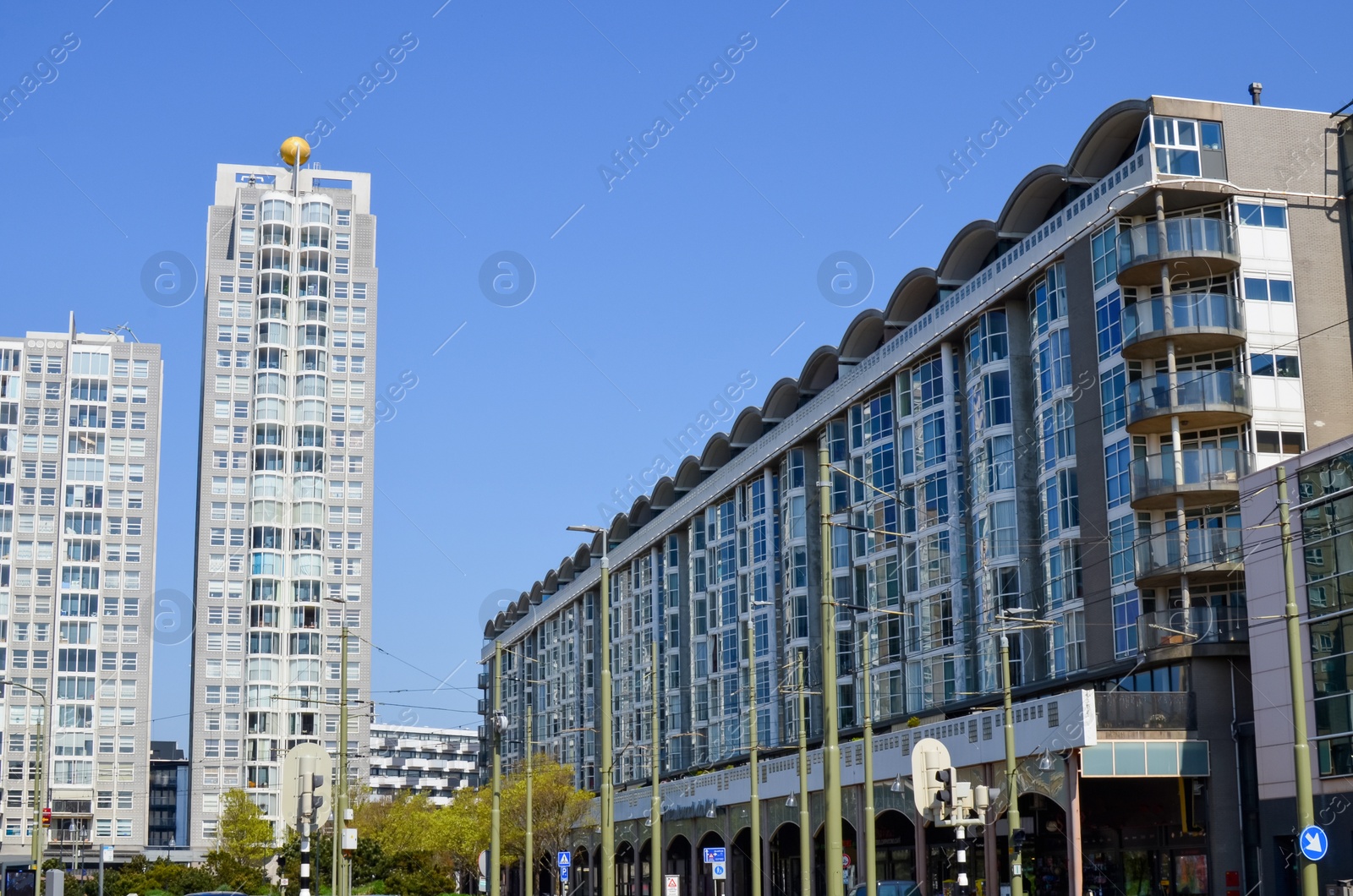 Photo of Beautiful modern buildings in city street. Urban architecture